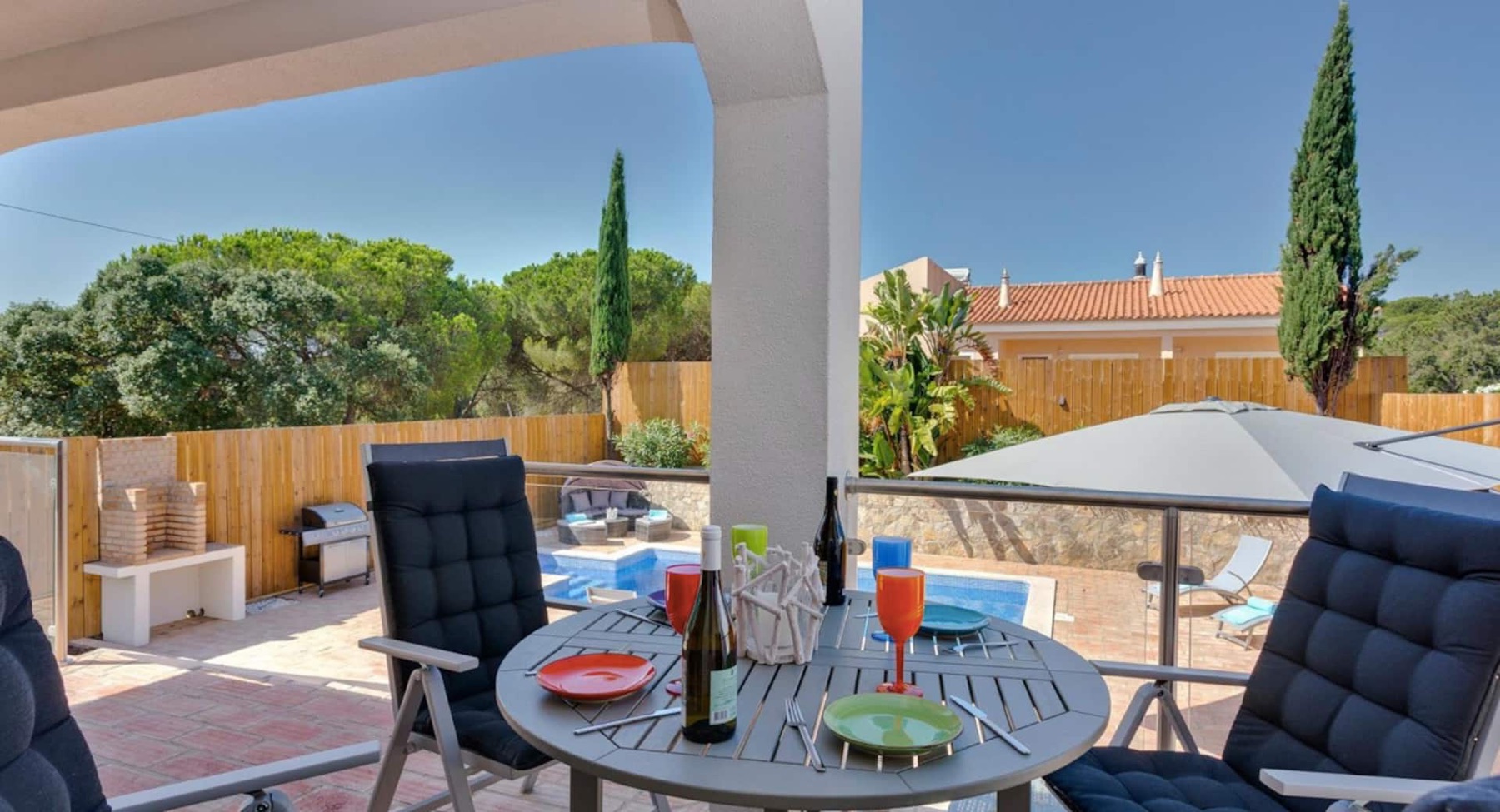 Table set for alfresco dining on the covered terrace