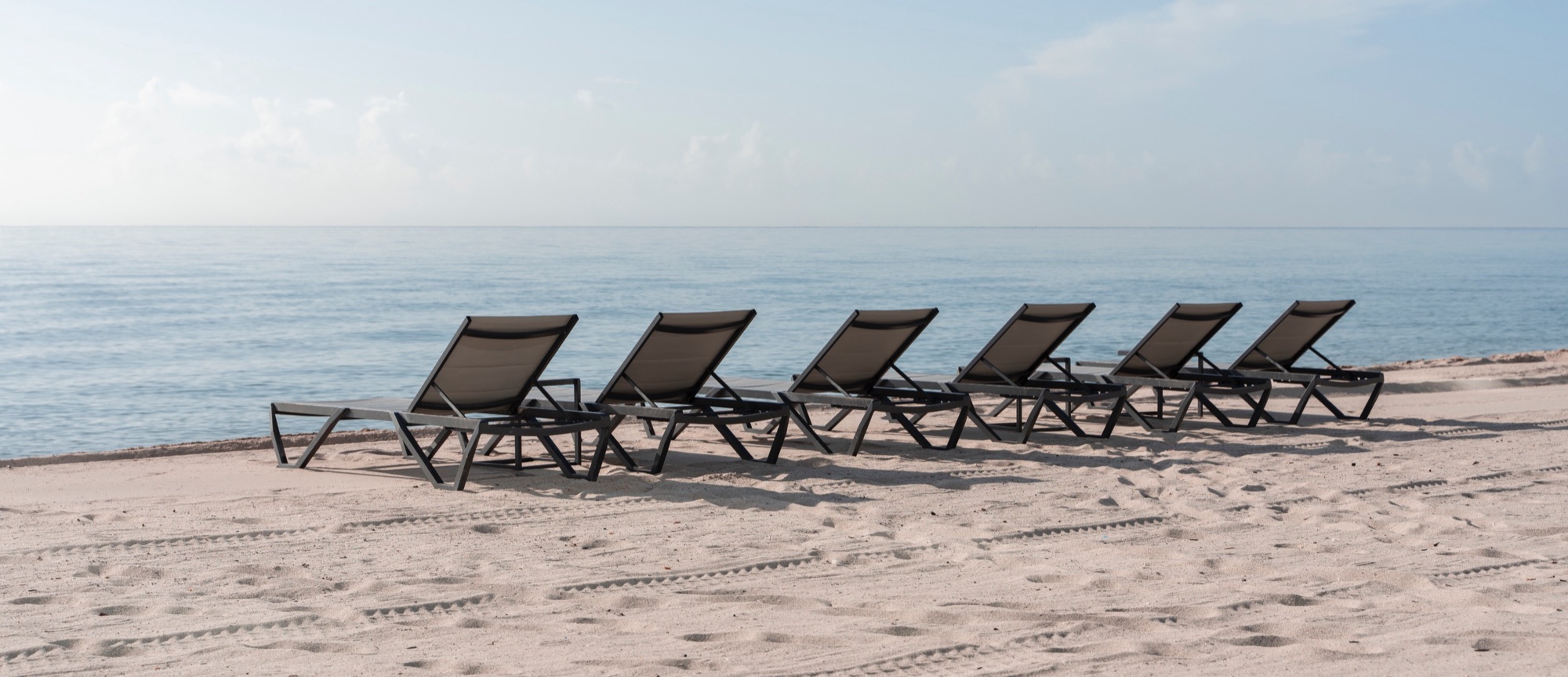 Sun loungers on a quiet Algarve beach